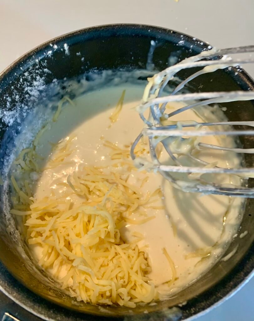 Béchamel preparation for the Croque Monsieur, the typical French sandwich 