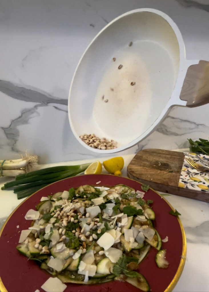 Zucchini, honey, parmesan, and toasted pine nuts – the perfect combo for a delicious appetizer.